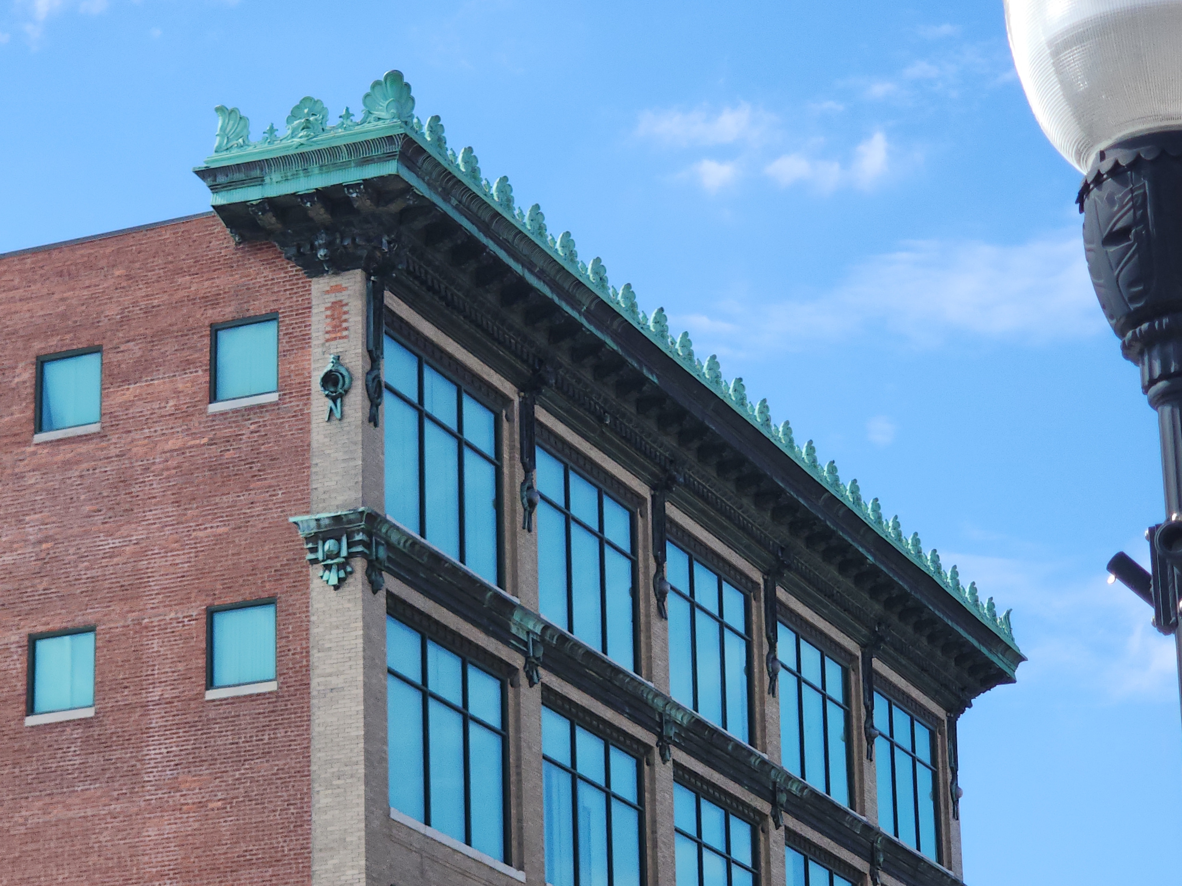 Historic Joplin Brick Building with Ornate Green Cornice